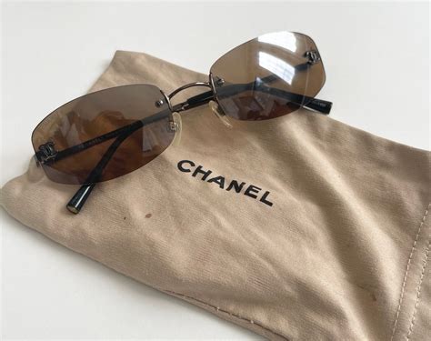 chanel rimless flower sunglasses|Chanel sunglasses with clear sides.